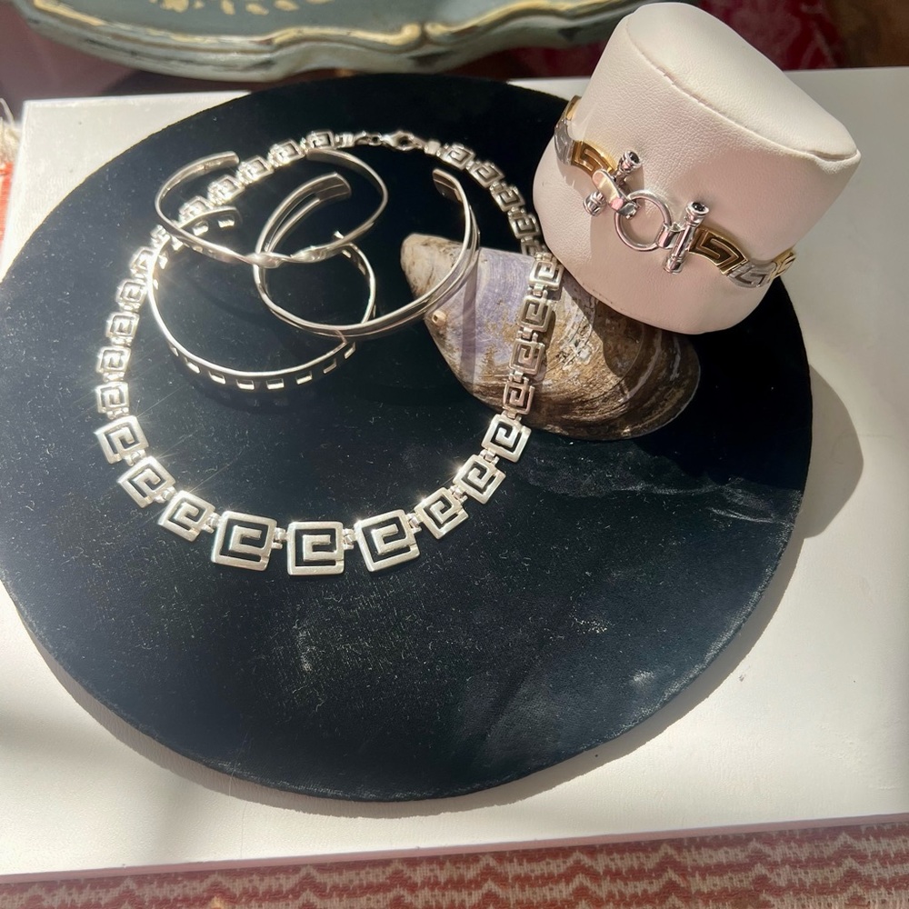 Five piece sterling silver jewelry lot